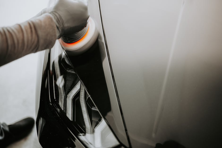 Detailer polishing car paint for protection